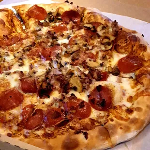 14&quot; pie with sausage, mushrooms, and pepperoni. $30.46 delivered with fees, tax, and tip.