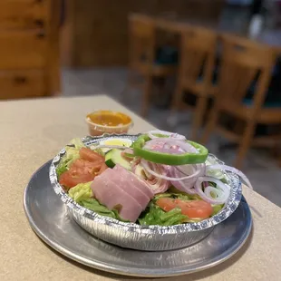 Salad with rolled meats