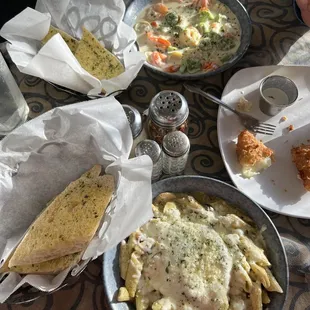 Smothered chicken, shrimp ravioli &amp; fried cheese