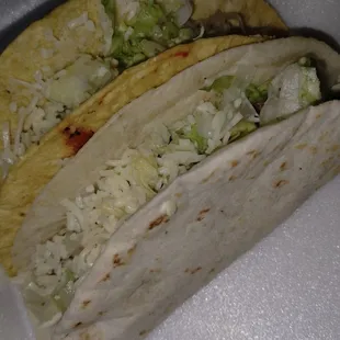 Chicken &amp; Beef tacos. You get sour cream &amp; a little bit of pico on the side for them. Chicken is not shredded, wish it was.