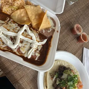 Mole enchiladas , carne asada taco