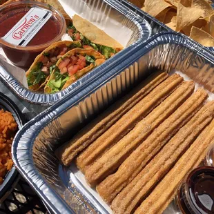 Churros with Dipping Sauce, Chips, Crispy Tacos, Salsa