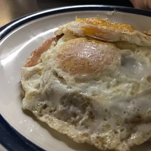 Pancakes with eggs on top. Perfectly cooked.