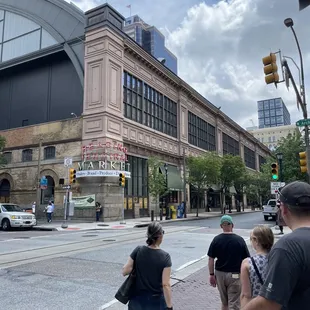 a group of people crossing the street