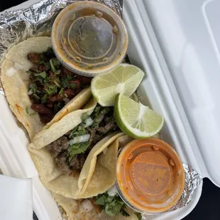 Asada, carnitas, chicken tacos at $2.50 each