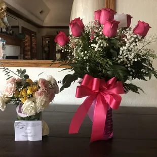 Expensive well known flower shop to the left. Carmens flower shop to the right.