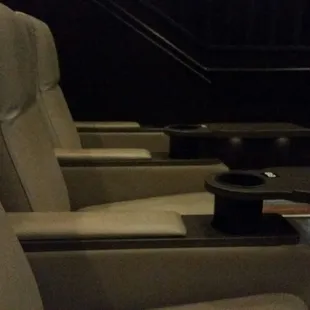 Seats - reclining, extra deep cup holder, movable tray table