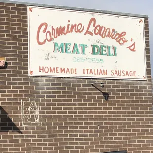 a sign on the side of a building