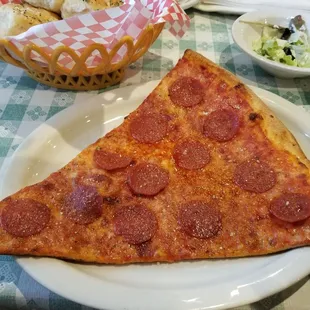 a slice of pepperoni pizza