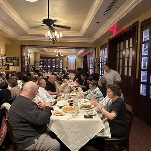 a large group of people eating