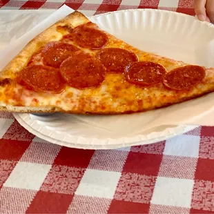 Slice of Pepperoni pizza