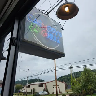 a neon sign for a restaurant