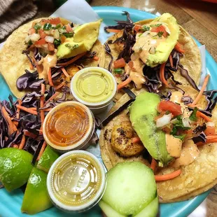 Shrimp tacos are served on flour tortilla but corn is tastier!