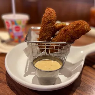 Fried pickles with house sauce. Four pickle spears included in order.