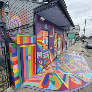 a colorful mural on the side of a building