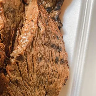 a close up of a piece of meat