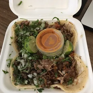 2 carnitas tacos and 2 carne asada tacos to go with a soda $5.99