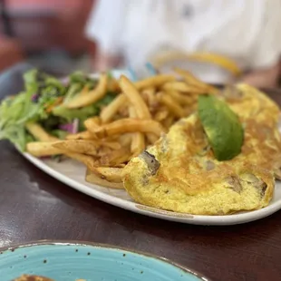 an omelet and french fries