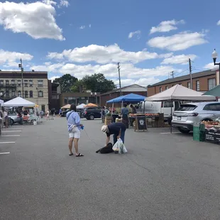 farmers and vendors in a parking lot