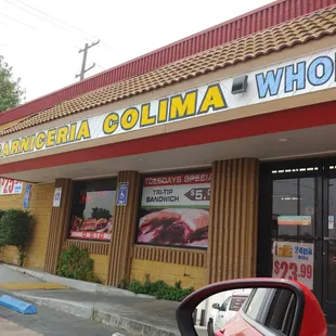 a view of the outside of a restaurant