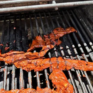 a close up of a barbecue grill