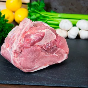 a piece of meat on a cutting board