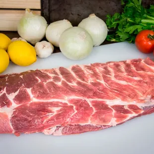 a piece of meat on a cutting board