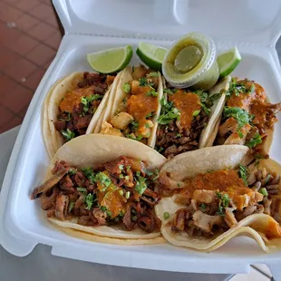 Tacos! Top row has Adobada or Al Pastor, Pollo, Carne Asada, and Carnitas. Bottom row has Tripa and Buche.