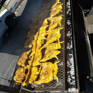 a carniceria being cooked on a grill