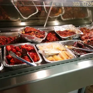 Assortment of the cooked meats you can buy. Eat here or take it to go. I tried the barbacoa and ribs. Delicious.