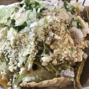 Super nachos loaded with everything &amp; solid when you hold it! Can share it with 2 people!