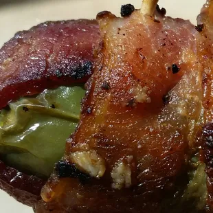 What my mouth sees before biting into a bacon stuffed wrapped jalapeno pepper.