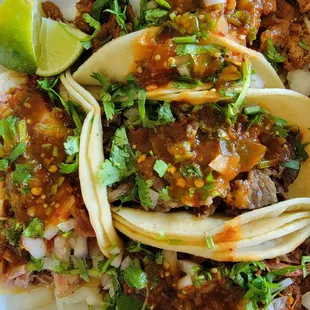 Carnitas, adobada, cabeza and birria tacos. Adobada was great. Birria not so great.