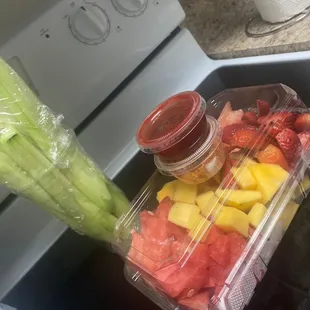 a container of fruit and vegetables