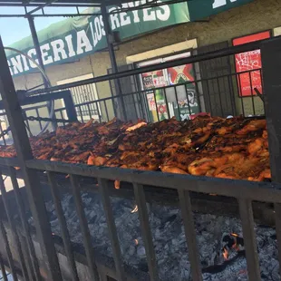 a grill full of chicken