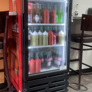 a refridgerator filled with drinks