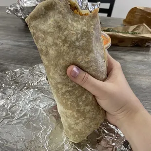 Carne asada burrito with rice and beans