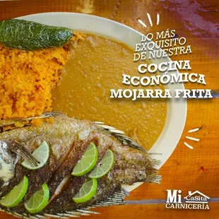 a plate of fish and rice