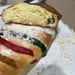 a piece of a pastry with a bite taken out of it