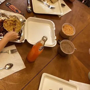 a young boy eating a burrito