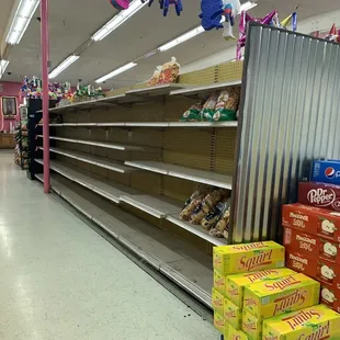 Empty shelves during pandemic. Note they started restocking tortillas with limit 1 pack per person