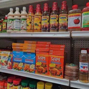 a variety of condiments on shelves