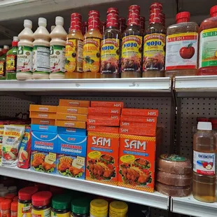 a variety of condiments on shelves