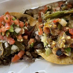 Carne Asada tacos! Tough, chewy, unflavored meat!