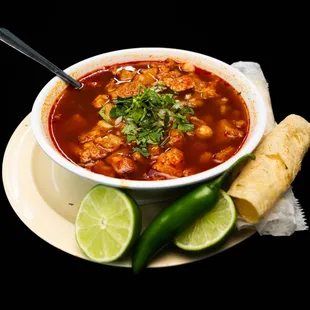 a bowl of chili and tortilla