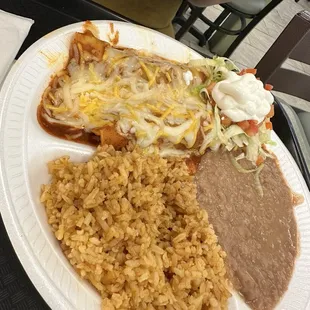Enchilada, beans and rice