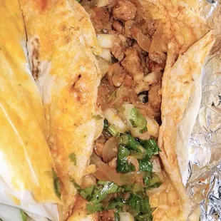 Al pastor taco, big but $2.50..very fatty, messy, no sweetness, but I liked the stewed onions, 3/5