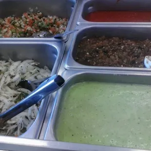 choose from any of our fresh-made salsas (avocado sauce, red chile sauce and our most popular one Roasted salsa)