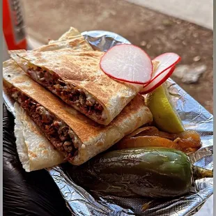 a person holding a plate of food
