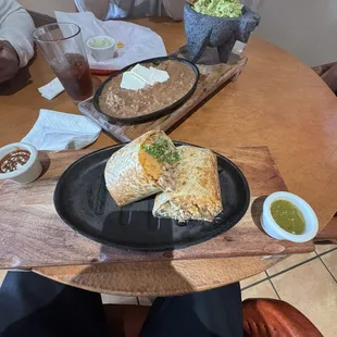 Carnitas Burrito, beans with cheese, guacamole with chicharones